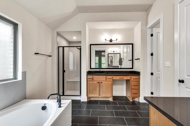 full bath featuring a stall shower, a bath, vanity, tile patterned flooring, and vaulted ceiling