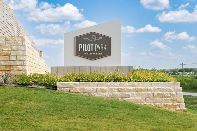 9407 Flatbush Dr, Austin, TX 78744 - community sign featuring a lawn