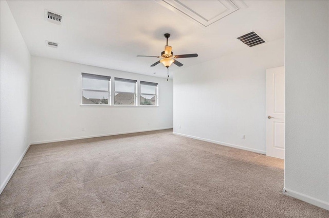 5701 Cherokee Draw Rd, Austin, TX 78738 - carpeted spare room featuring a ceiling fan, attic access, and baseboards
