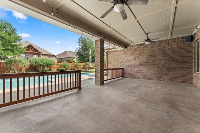 5701 Cherokee Draw Rd, Austin, TX 78738 - fenced backyard with a ceiling fan and a patio area