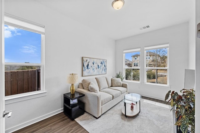 1209 Willie Ranch Way, Leander, TX 78641 - living area featuring wood finished floors and baseboards