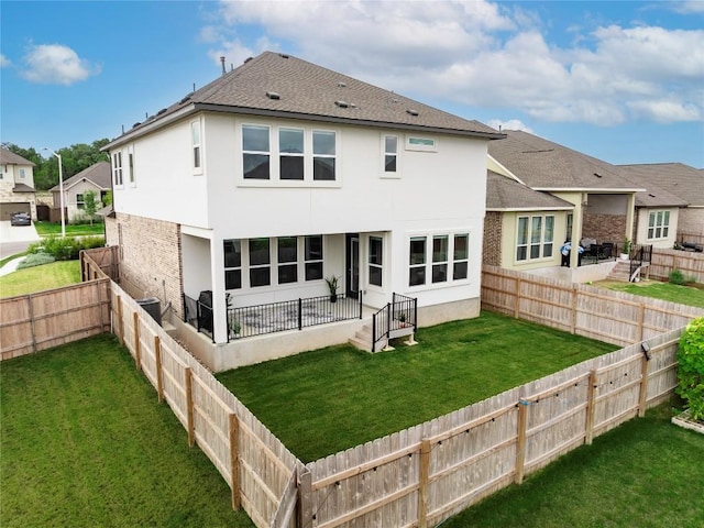 1209 Willie Ranch Way, Leander, TX 78641 - rear view of house with stucco siding and roof with shingles