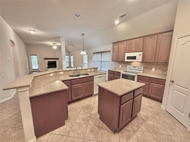 608 Pebblestone Walk Dr, Cedar Park, TX 78613 - kitchen with white appliances, a spacious island, backsplash, open floor plan, and ceiling fan