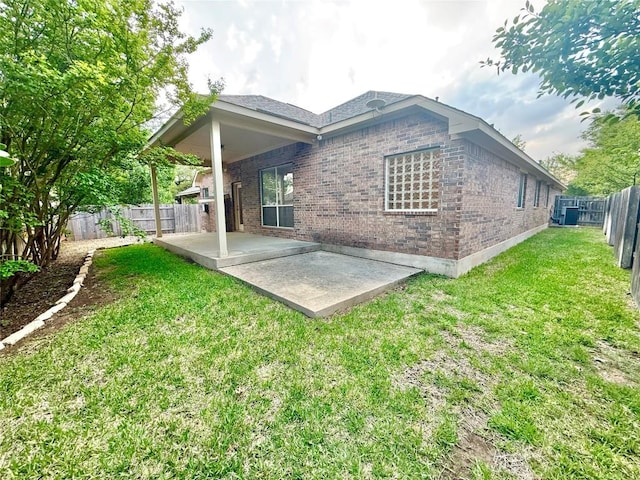 608 Pebblestone Walk Dr, Cedar Park, TX 78613 - rear view of property with a patio area, brick siding, and a fenced backyard