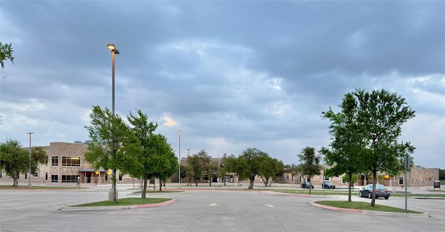 view of street featuring curbs and street lights