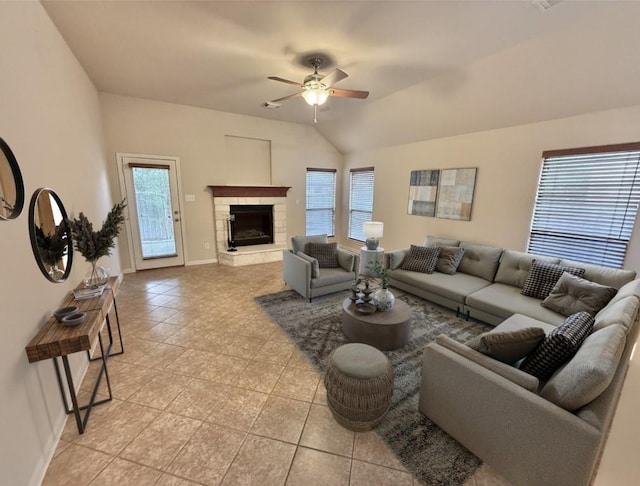 608 Pebblestone Walk Dr, Cedar Park, TX 78613 - living room featuring ceiling fan, healthy amount of natural light, light tile patterned flooring, a stone fireplace, and vaulted ceiling