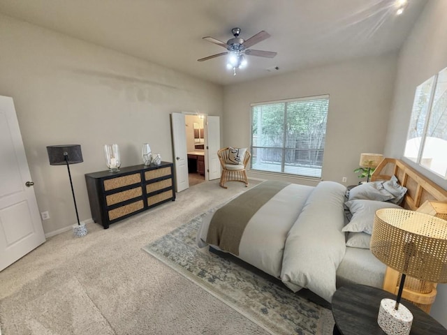608 Pebblestone Walk Dr, Cedar Park, TX 78613 - carpeted bedroom with multiple windows, ensuite bath, and ceiling fan