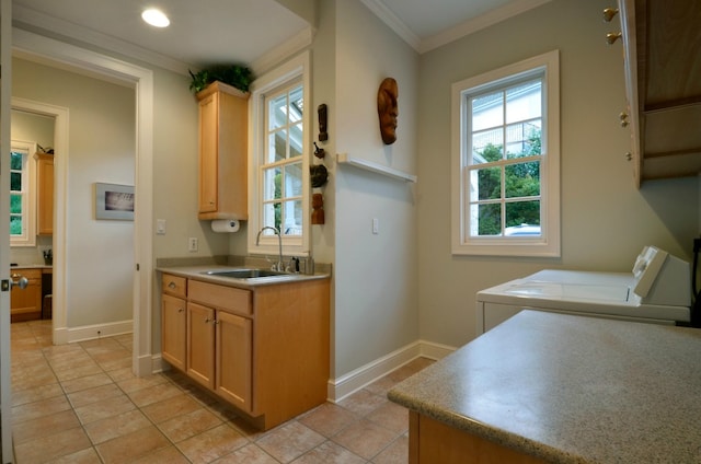 3208 Rain Dance Cv, Austin, TX 78746 - kitchen featuring washer and clothes dryer, ornamental molding, light brown cabinets, and light tile patterned floors