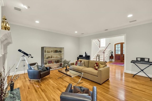 3208 Rain Dance Cv, Austin, TX 78746 - living area featuring stairway, light wood-type flooring, crown molding, and recessed lighting