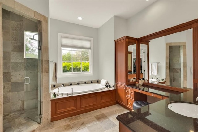 3208 Rain Dance Cv, Austin, TX 78746 - bathroom featuring vanity, a bath, a shower stall, and recessed lighting