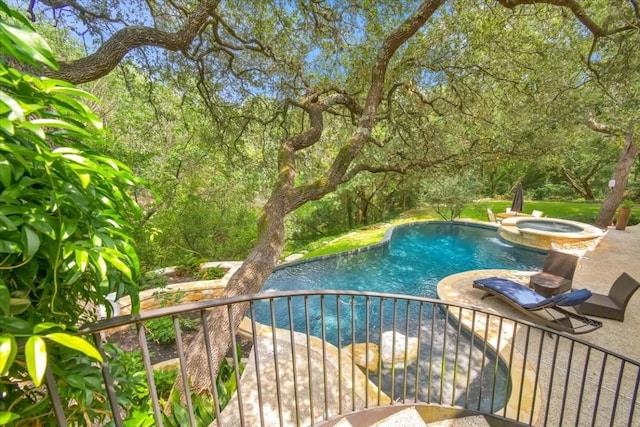 3208 Rain Dance Cv, Austin, TX 78746 - view of pool with a pool with connected hot tub and a patio area