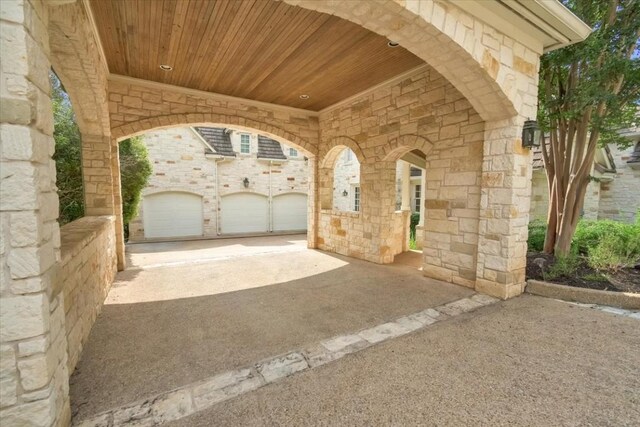 3208 Rain Dance Cv, Austin, TX 78746 - view of patio / terrace with driveway