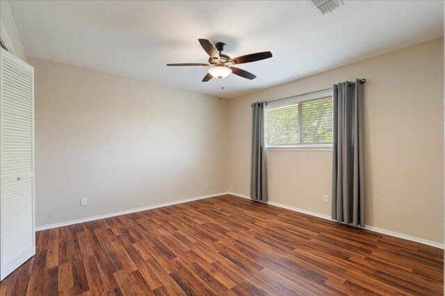 8204 Seminary Ridge Dr, Austin, TX 78745 - unfurnished room with wood finished floors and ceiling fan