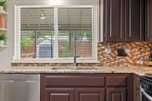 8204 Seminary Ridge Dr, Austin, TX 78745 - kitchen featuring dishwasher, decorative backsplash, dark brown cabinets, light stone counters, and black gas stove