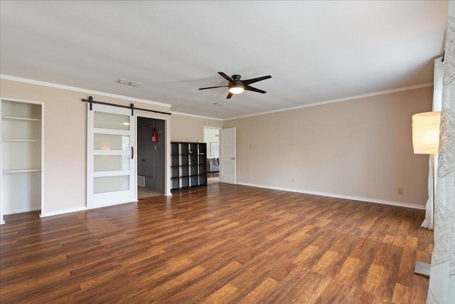 8204 Seminary Ridge Dr, Austin, TX 78745 - unfurnished living room featuring a ceiling fan, wood finished floors, a barn door, built in shelves, and crown molding
