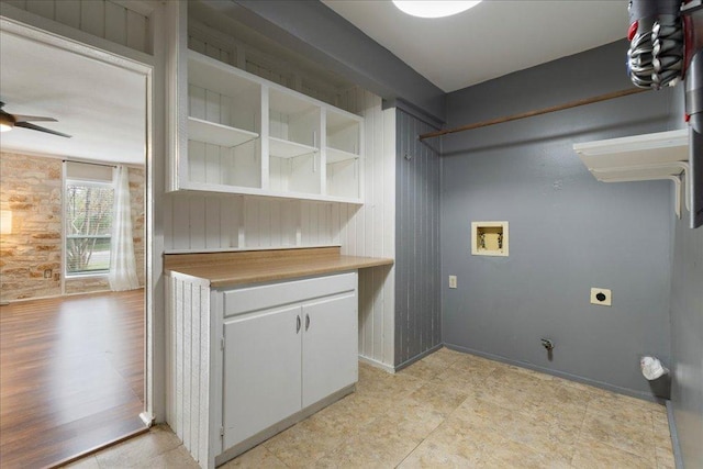 8204 Seminary Ridge Dr, Austin, TX 78745 - laundry area with hookup for an electric dryer, hookup for a washing machine, ceiling fan, and cabinet space