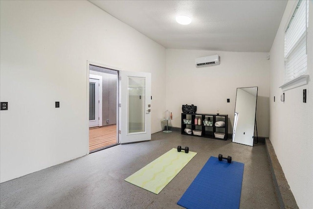 8204 Seminary Ridge Dr, Austin, TX 78745 - exercise area with lofted ceiling and a wall mounted air conditioner