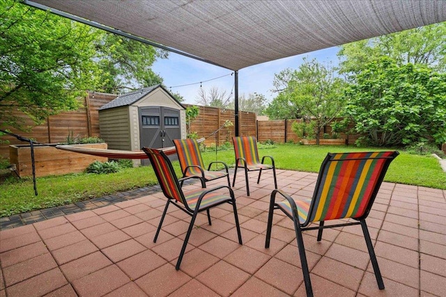 8204 Seminary Ridge Dr, Austin, TX 78745 - fenced backyard featuring a patio and a storage unit