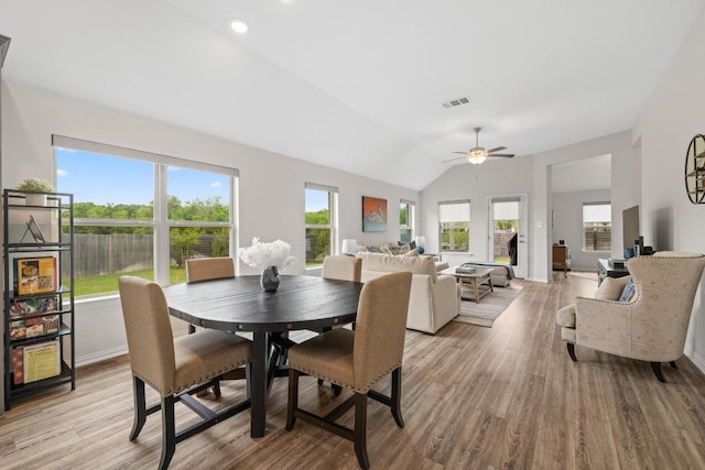 608 Roaming Dr, Hutto, TX 78634 - dining space featuring light wood-style floors, a ceiling fan, vaulted ceiling, and recessed lighting