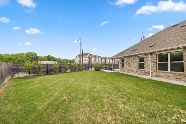 608 Roaming Dr, Hutto, TX 78634 - fenced backyard featuring a patio area