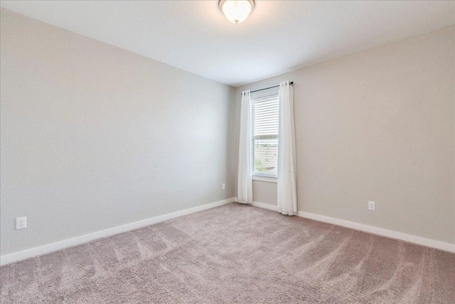 109 Pine Is, Leander, TX 78641 - carpeted empty room with baseboards