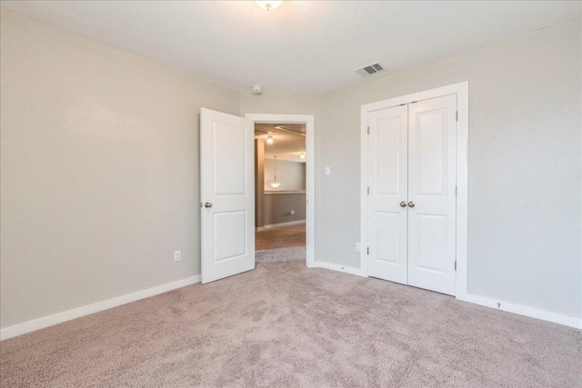109 Pine Is, Leander, TX 78641 - unfurnished bedroom featuring carpet floors and a closet