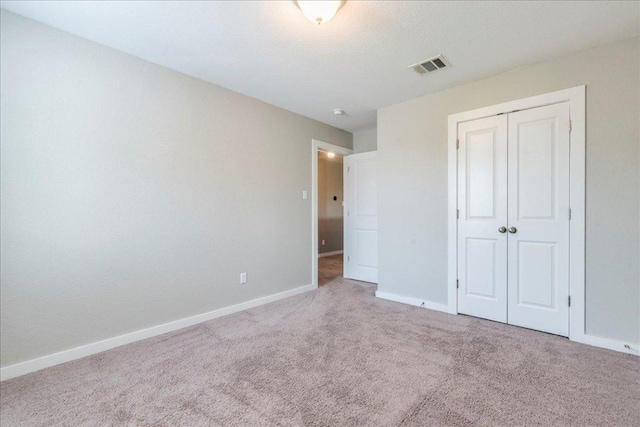 109 Pine Is, Leander, TX 78641 - unfurnished bedroom with carpet and a closet