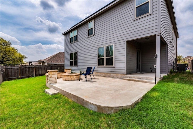 109 Pine Is, Leander, TX 78641 - back of house featuring a fire pit, a patio area, and a fenced backyard