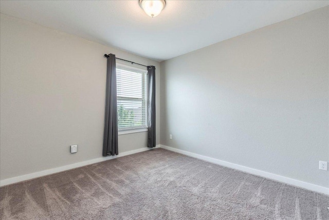 109 Pine Is, Leander, TX 78641 - carpeted spare room with baseboards