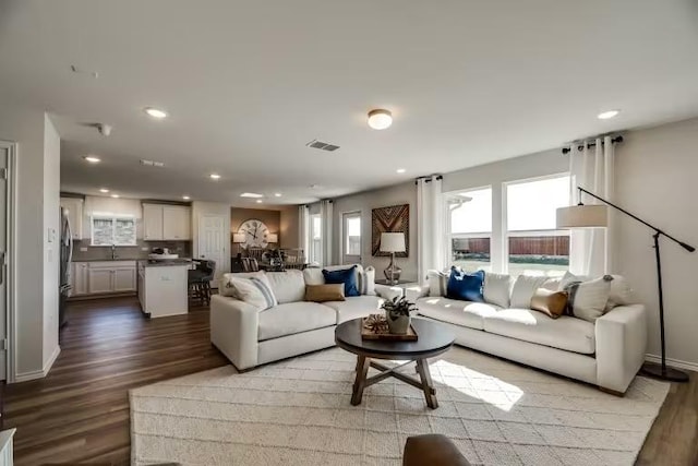 13328 Lapoynor St, Manor, TX 78653 - living room with wood finished floors and recessed lighting