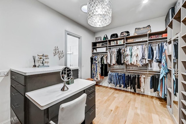 9206 Chisholm Ln, Austin, TX 78748 - walk in closet featuring light wood-style flooring