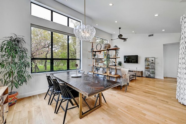9206 Chisholm Ln, Austin, TX 78748 - dining space featuring light wood finished floors, recessed lighting, baseboards, and a chandelier