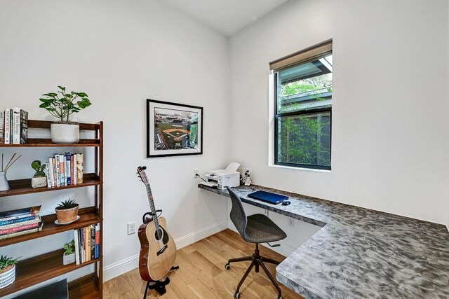 9206 Chisholm Ln, Austin, TX 78748 - office with light wood finished floors and built in study area