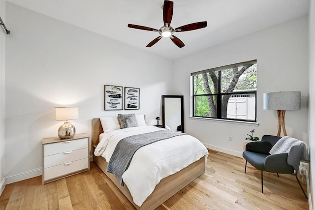 9206 Chisholm Ln, Austin, TX 78748 - bedroom with baseboards, light wood-style flooring, and ceiling fan