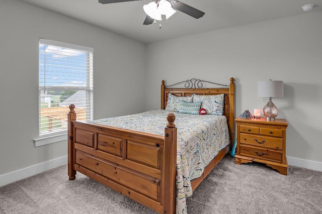 109 Spice Bush Spgs, Leander, TX 78641 - bedroom with light carpet, baseboards, and a ceiling fan