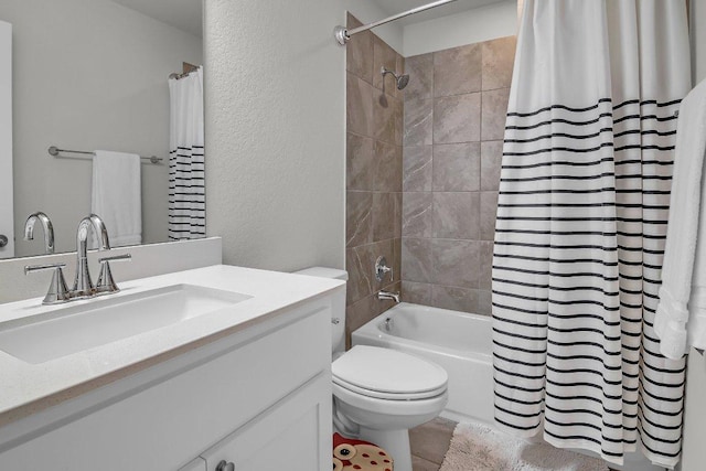 109 Spice Bush Spgs, Leander, TX 78641 - bathroom with a textured wall, vanity, toilet, and shower / bath combo