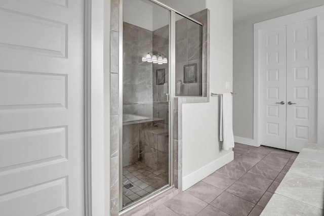 109 Spice Bush Spgs, Leander, TX 78641 - full bathroom with a stall shower and baseboards