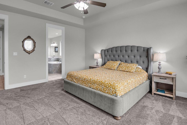 109 Spice Bush Spgs, Leander, TX 78641 - carpeted bedroom with baseboards, ensuite bath, and ceiling fan
