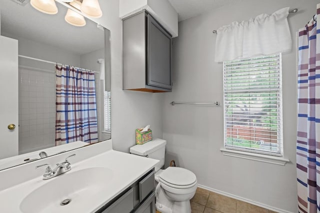 8410 Glen Canyon Dr, Round Rock, TX 78681 - bathroom with vanity, tile patterned flooring, and curtained shower