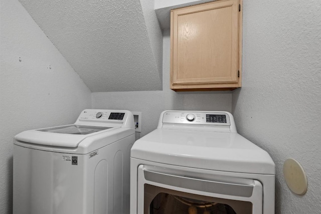 8410 Glen Canyon Dr, Round Rock, TX 78681 - laundry room with cabinet space and independent washer and dryer