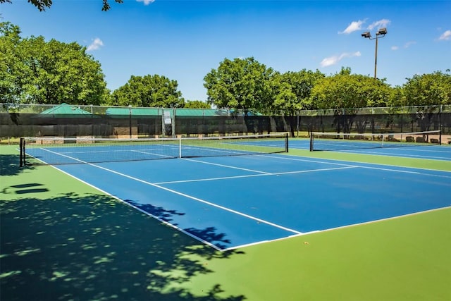 8410 Glen Canyon Dr, Round Rock, TX 78681 - view of tennis court with community basketball court