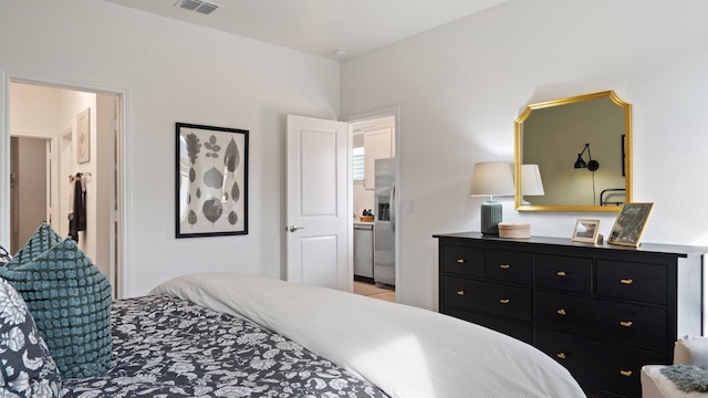 2620 Caleb Asher Loop, Round Rock, TX 78665 - bedroom featuring stainless steel fridge with ice dispenser