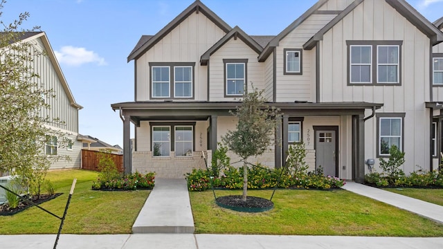2620 Caleb Asher Loop, Round Rock, TX 78665 - view of front facade featuring board and batten siding and a porch