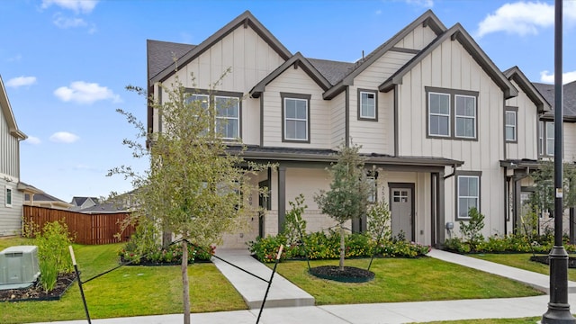 2620 Caleb Asher Loop, Round Rock, TX 78665 - view of front of property with board and batten siding and roof with shingles