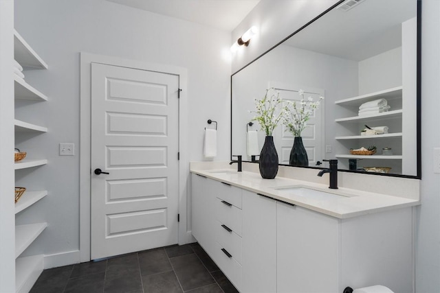 2220 Webberville Rd Unit 207, Austin, TX 78702 - full bath with double vanity and tile patterned floors