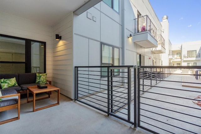 2220 Webberville Rd Unit 207, Austin, TX 78702 - balcony featuring an outdoor living space
