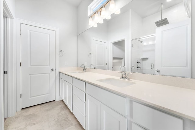 2201 Cento Walk Unit 70, Round Rock, TX 78664 - full bath featuring a stall shower and double vanity