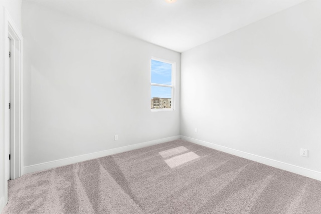 2201 Cento Walk Unit 70, Round Rock, TX 78664 - empty room with carpet floors and baseboards