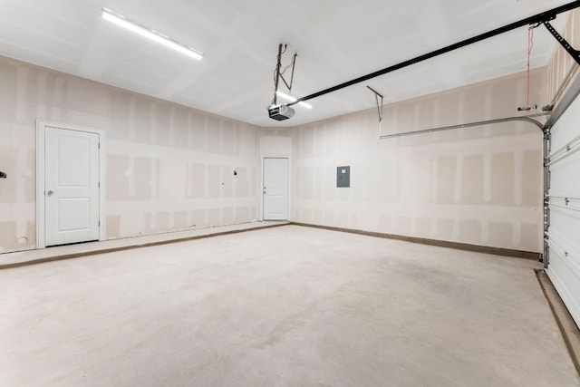 2201 Cento Walk Unit 70, Round Rock, TX 78664 - garage with electric panel and a garage door opener
