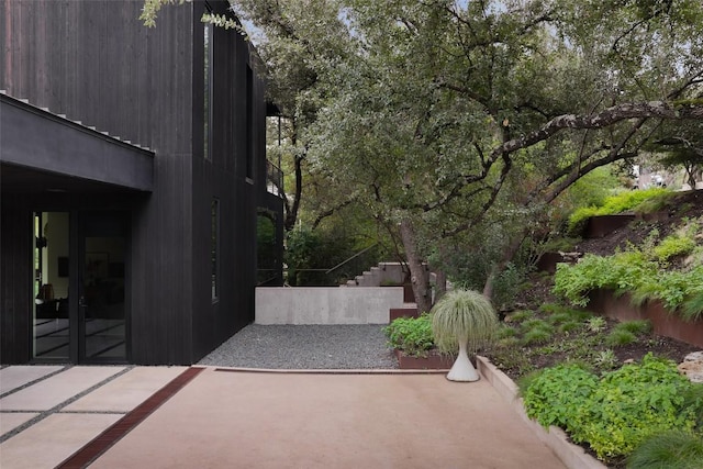 2700 Stratford Dr, Austin, TX 78746 - view of side of property with a patio area